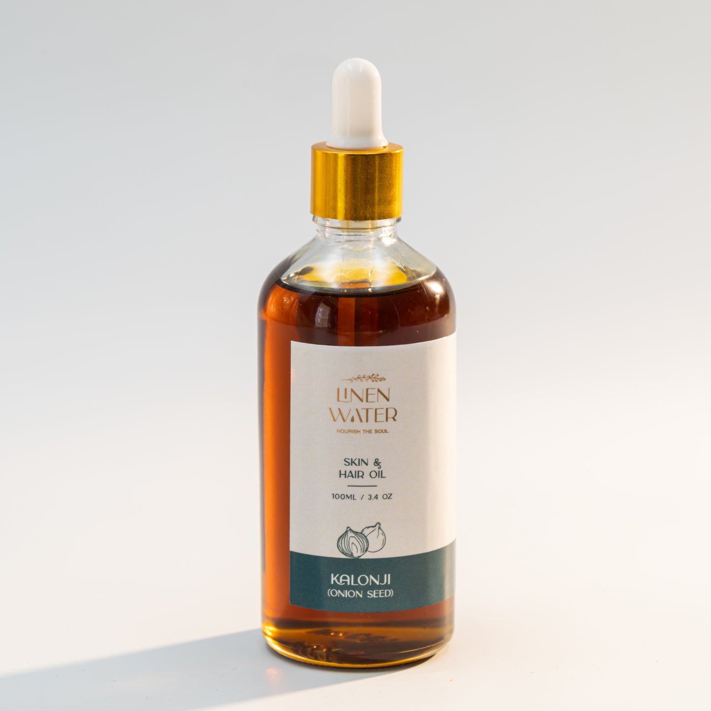 Stronger hair roots, less hair loss, and quicker, thicker hair growth are all benefits of using Linen Water Kalonji Onion Seed Hair Oil. This herbal hair oil, enhanced with natural kalonji and onion extracts, promotes healthy, strong hair, increases shine, and refreshes the scalp.