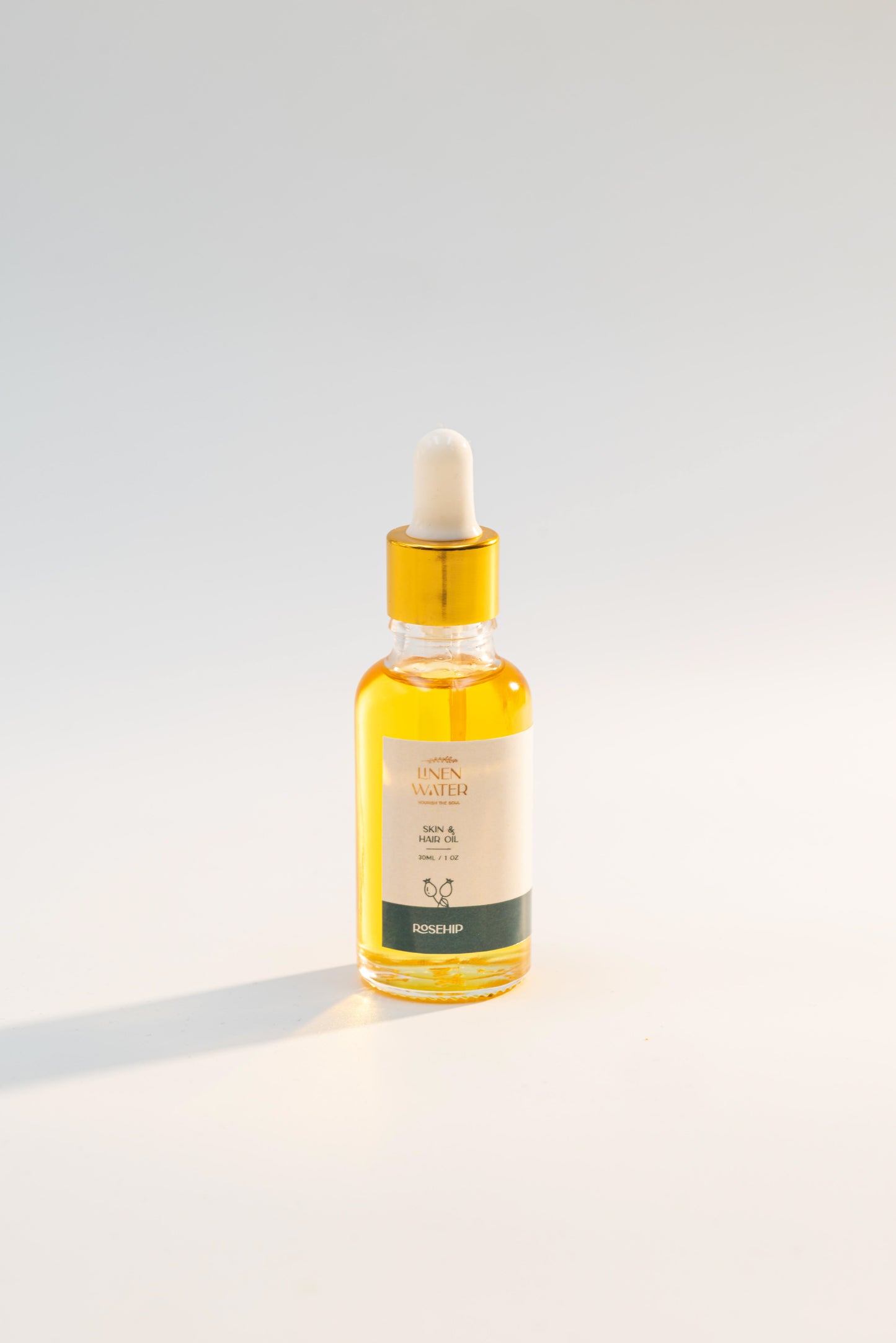 When used to a bright surface, Linen Water's natural Rosehip Skin & Hair Oil provides hydration, strength, and shine while restoring damaged hair and dull skin for a naturally glowing, healthy look.