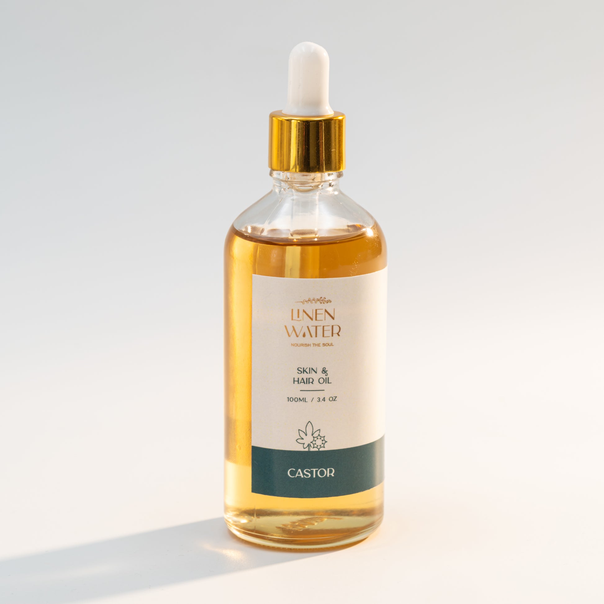 A deeply nourishing blend, Linen Water Castor Skin & Hair Oil hydrates dry skin, strengthens roots, and promotes hair growth, leaving it naturally soft and smooth.