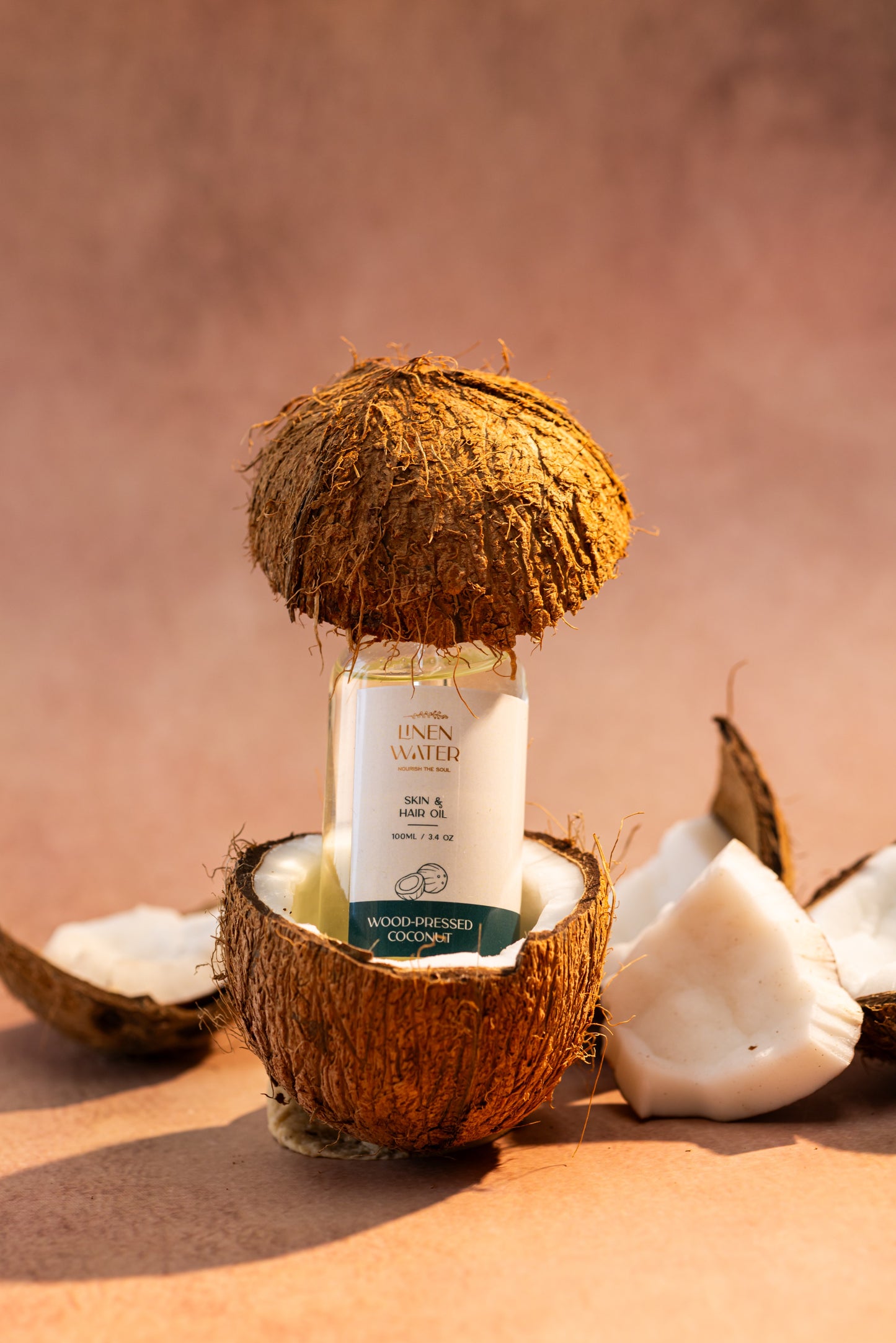 Linen Water's Wood-Pressed Coconut Skin & Hair Oil offers pure care.  It keeps your skin and hair looking healthy by repairing, hydrating, and recovering the natural balance.