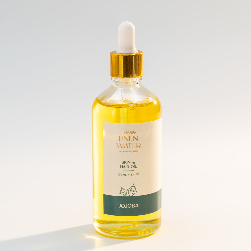 Linen Water Jojoba Oil for Skin and Hair provides deep nourishment and protection, a healthy, natural glow, and intense hydration with every use.  This pure jojoba skin and hair oil is ideal for everyday natural skincare and haircare routines because it helps restore softness, shine, and smooth texture while also moisturizing dry skin and repairing damaged hair.
