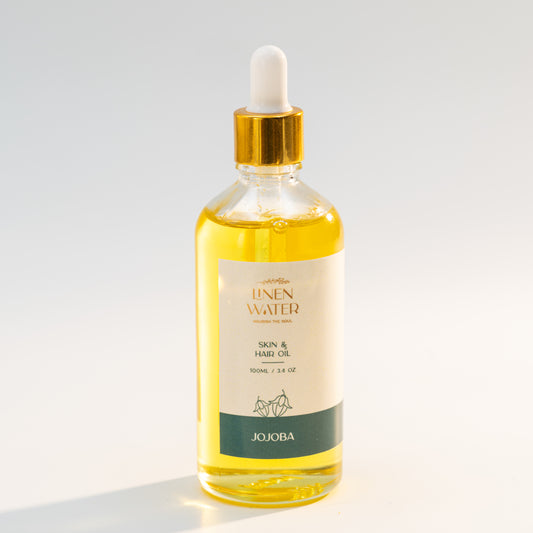 Linen Water Jojoba Oil for Skin and Hair provides deep nourishment and protection, a healthy, natural glow, and intense hydration with every use.  This pure jojoba skin and hair oil is ideal for everyday natural skincare and haircare routines because it helps restore softness, shine, and smooth texture while also moisturizing dry skin and repairing damaged hair.