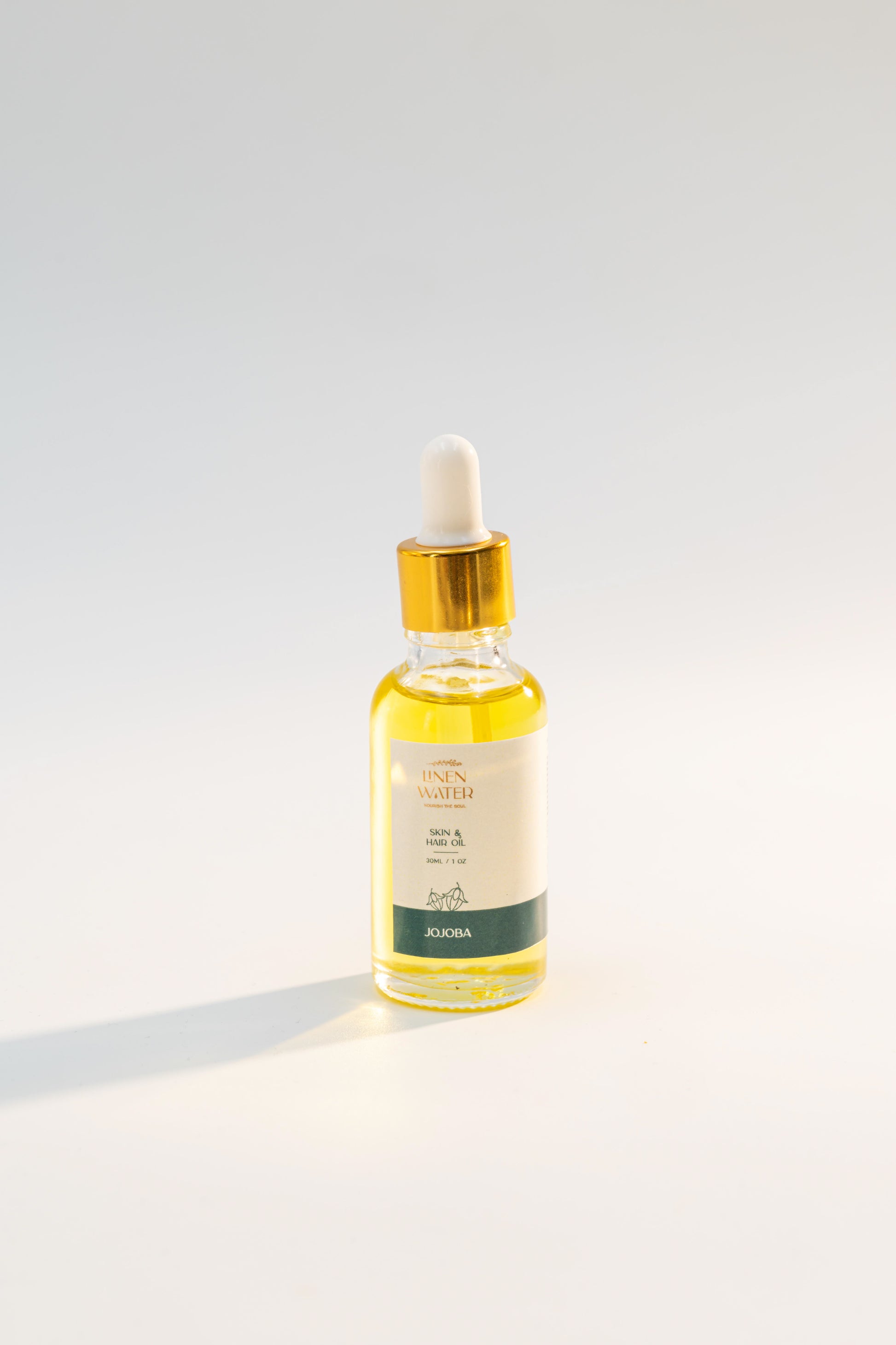 Use Linen Water's pure jojoba oil for restoring your skin and hair. It provides moisture, reduces damage, and gives you a natural glow.