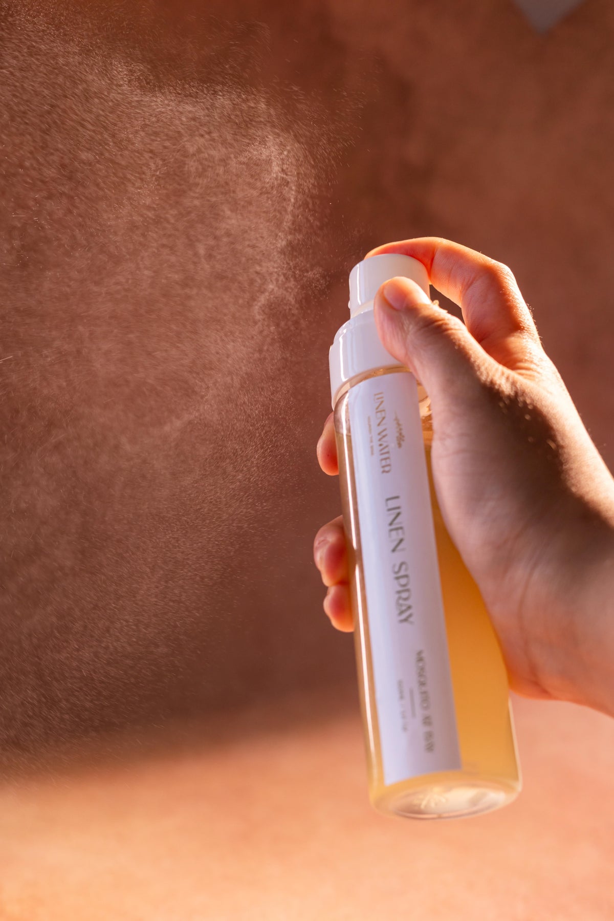Neroli and lily essence are added to linen water fabric and room spray to create a light, energetic fragrance that promotes rest and freshness.