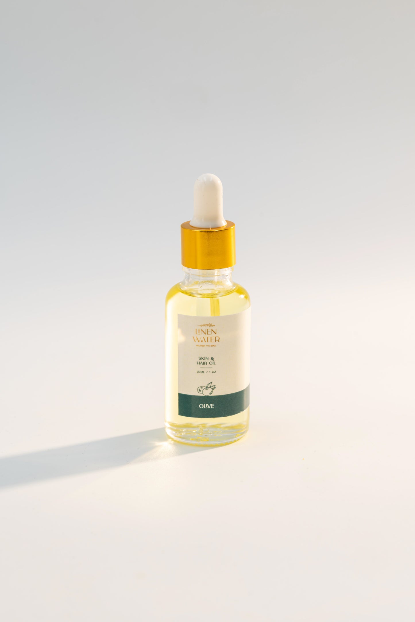 Experience glowing hair and healthy skin with Linen Water Olive Oil, a mild, lightweight formula that deeply hydrates and supports your overall health.