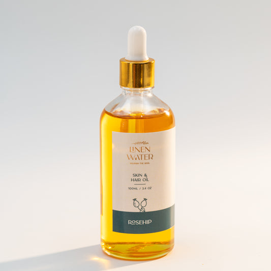 Linen Water Rosehip Oil for Skin and Hair, which comes in a stylish glass dropper bottle and is packed with vitamins and antioxidants, leaves skin and hair feeling nourished, soft, and radiant.  With every use, this all-natural rosehip oil for skin and hair helps restore moisture, enhance texture, and encourage a glowing, fresh-looking look.