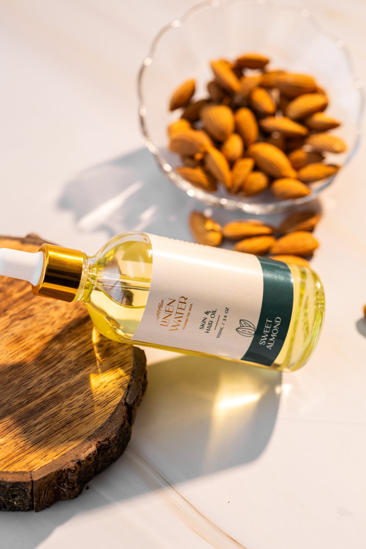 Linen's Sweet Almond Oil  Enhanced with natural vitamins for deep nourishment and daily brightness, this water is made for smooth, moisturized skin and shiny, smooth hair.