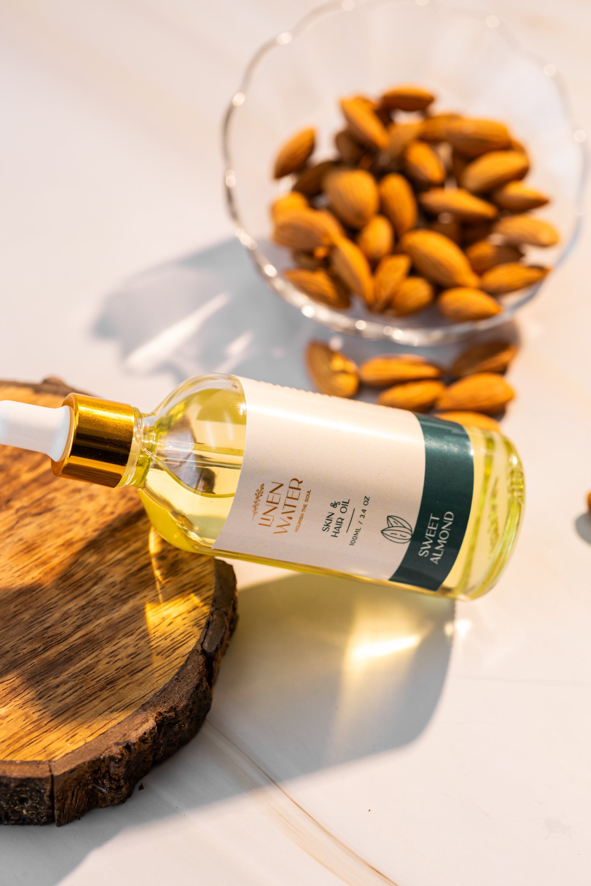 Linen's Sweet Almond Oil  Enhanced with natural vitamins for deep nourishment and daily brightness, this water is made for smooth, moisturized skin and shiny, smooth hair.
